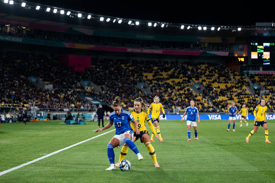 Lisa Boattin of Italy and Kosovare Asllani of Sweden