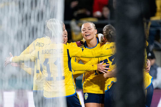 Stina Blackstenius and Fridolina Rolfö of Sweden celebrate
