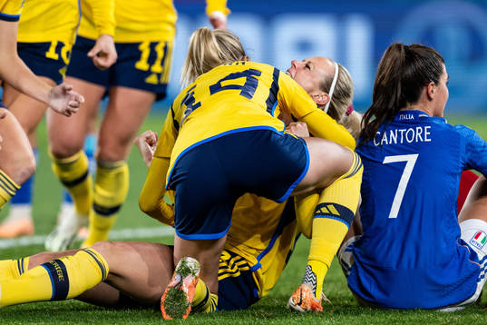 Nathalie Björn celebrates with Amanda Ilestedt of Sweden