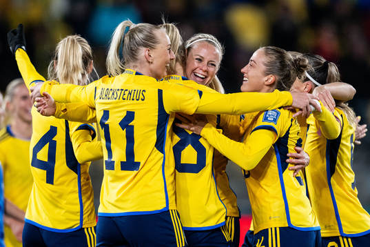 Amanda Ilestedt of Sweden celebrates with team mates