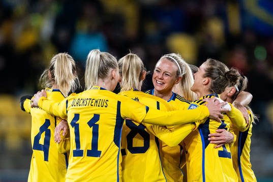 Amanda Ilestedt of Sweden celebrates with team mates