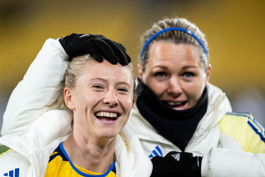 Rebecka Blomqvist and goalkeeper Jennifer Falk of Sweden