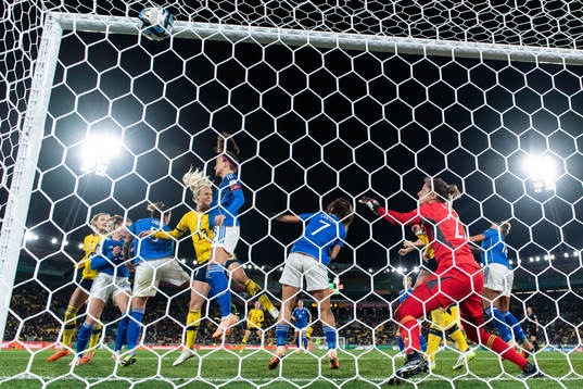 Amanda Ilestedt of Sweden scores 4-0 behind goalkeeper