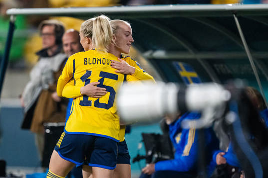 Anna Sandberg and Rebecka Blomqvist of Sweden hug