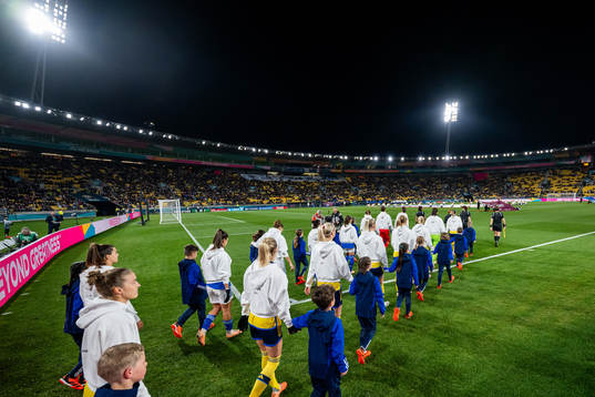Players of Sweden enter the pitch