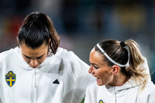 Goalkeeper Zecira Musovic and Kosovare Asllani of Sweden