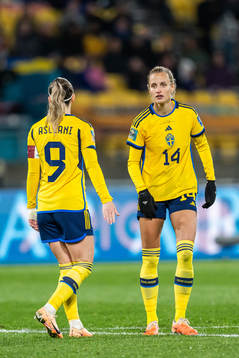 Kosovare Asllani and Nathalie Björn of Sweden