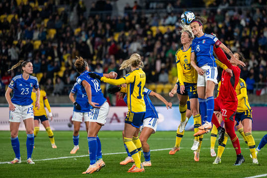 Amanda Ilestedt of Sweden competes for the ball with
