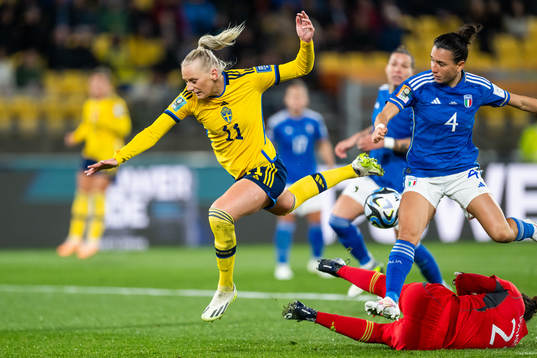 Stina Blackstenius of Sweden fall in a duel with goalkeeper