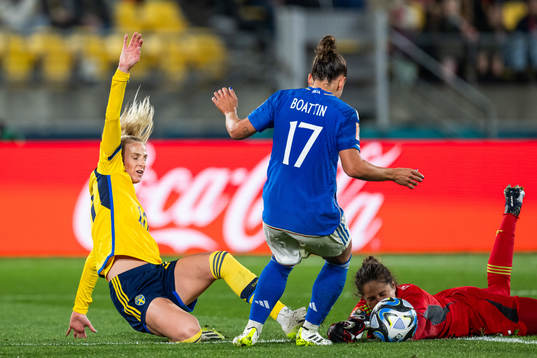 Sofia Jakobsson of Sweden competes for the ball with Lisa