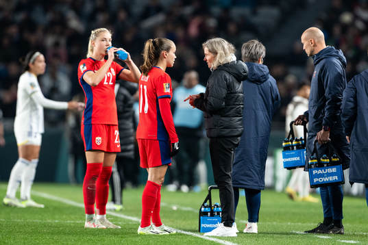 Guro Reiten and Head coach Hege Riise of Norway