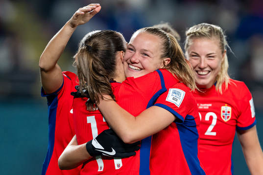 Guro Reiten and Frida Maanum of Norway celebrate