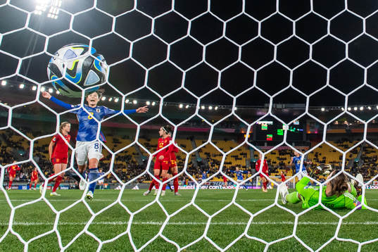 Hikaru Naomoto of Japan celebrates while goalkeeper Misa