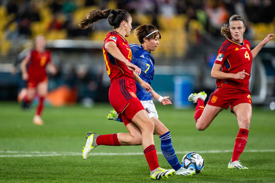 Hinata Miyazawa of Japan scores 1-0 competing with Rocia