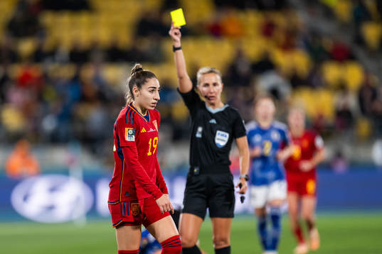 Referee Ekaterina Koroleva gives a yellow card to Olga