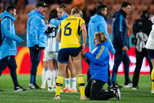 Magdalena Eriksson of Sweden receives medical attention by