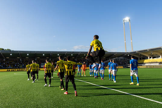 Players of Häcken and of Klaksvik enter the pitch