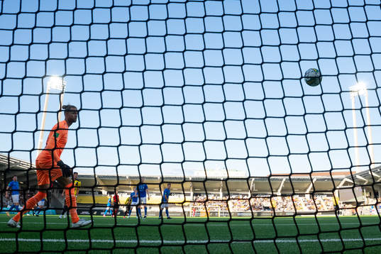 Tobias Sana of Häcken scores 1-1 behind goalkeeper Nils