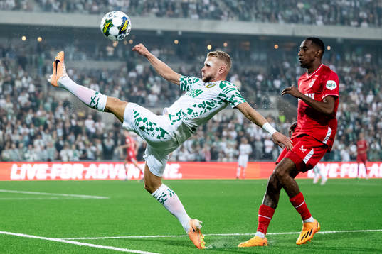 Simon Strand of Hammarby and Joshua Brenet of Twente