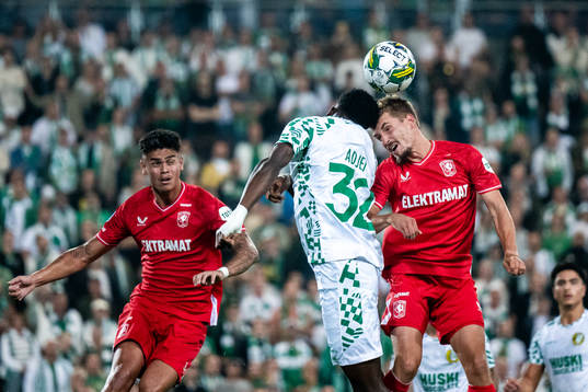 Nathaniel Adjei of Hammarby against Mees Hilgers and Michal
