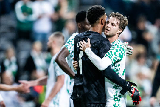 Goalkeeper Oliver Dovin and Joel Nilsson of Hammarby