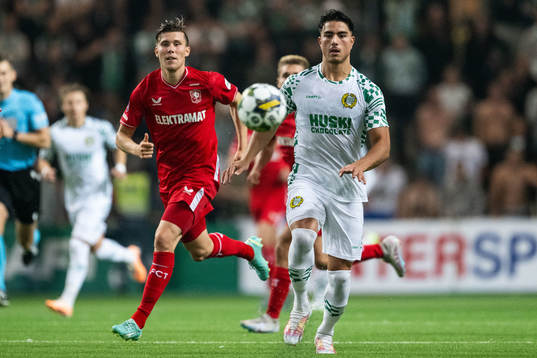 Alfons Sampsted of Twente and Jusef Erabi of Hammarby