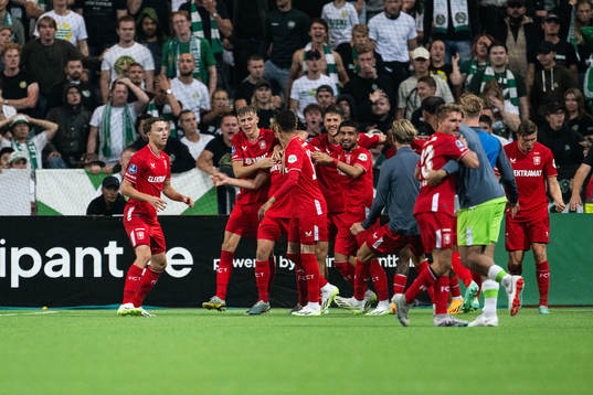 Players of Twente celebrate