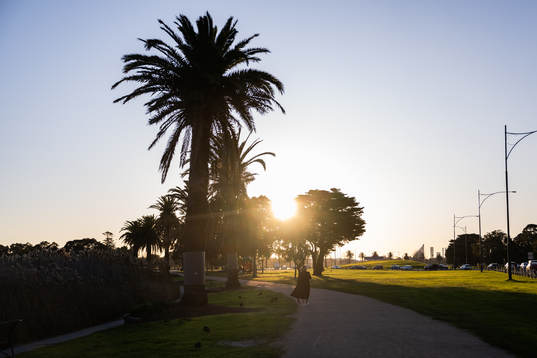 A woman walks in Albert Park