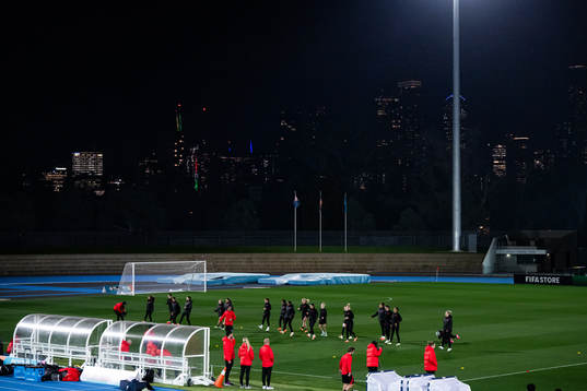 Players warm up at a training session with the women's