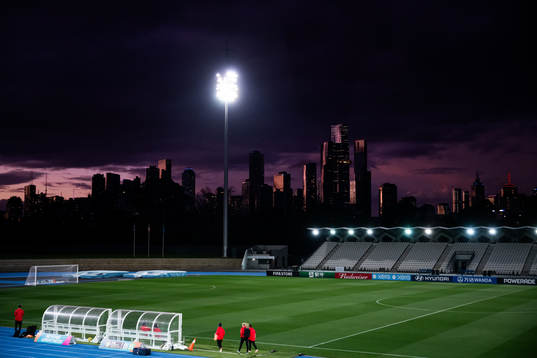 Staff arrive at a training session with the women's