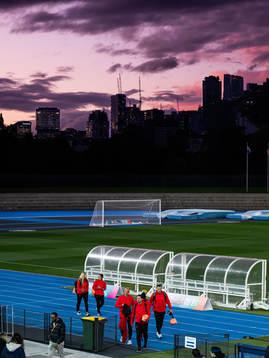 Staff arrive at a training session with the women's