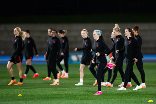 Megan Rapinoe with team mates at a training session with