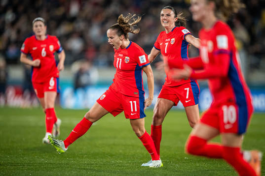 Guro Reiten and Ingrid Syrstad Engen of Norway celebrate