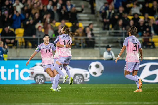 Jun Endo, Yui Hasegawa and Moeka Minami of Japan celebrate