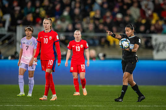 Caroline Graham Hansen of Norway and Referee Edina Alves