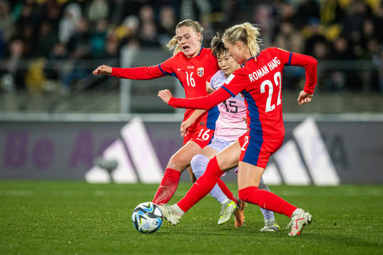 Mathilde Harviken and Sophie Román Haug of Norway and Aoba