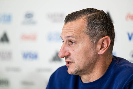Head coach Vlatko Andonovski at a press conference with the