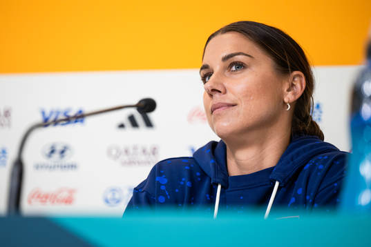 Alex Morgan at a press conference with the women's national