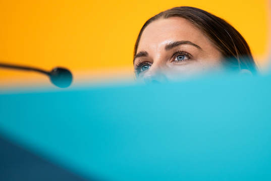Alex Morgan at a press conference with the women's national
