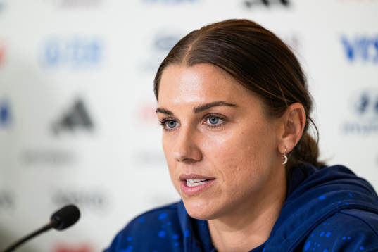 Alex Morgan at a press conference with the women's national