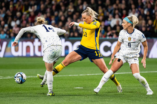 Emily Sonnett and Julie Ertz of USA against Stina