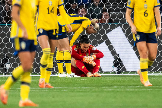 Amanda Ilestedt and goalkeeper Zecira Musovic of Sweden
