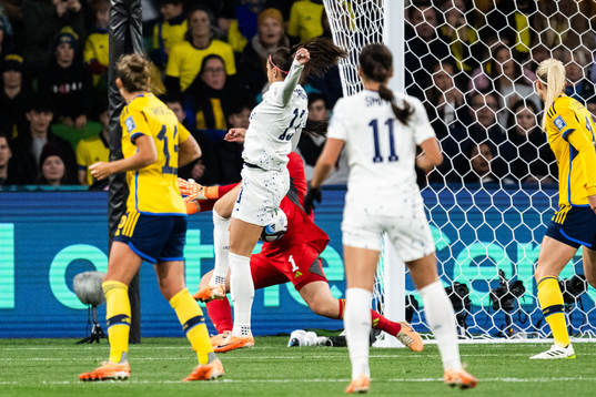 Alex Morgan of USA and goalkeeper Zecira Musovic of Sweden