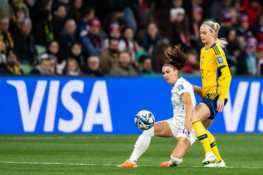 Alex Morgan of USA and Amanda Ilestedt of Sweden