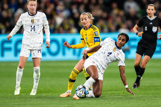 Kosovare Asllani of Sweden and Naomi Girma of USA
