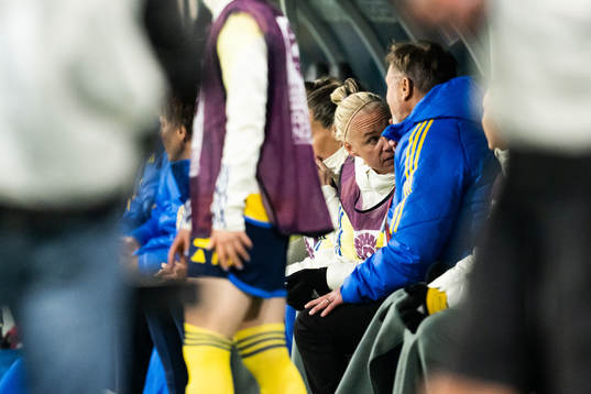 Caroline Seger and Head coach Peter Gerhardsson of Sweden