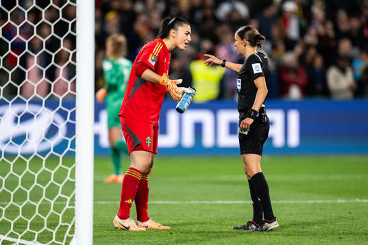 Goalkeeper Zecira Musovic of Sweden and referee Stephanie