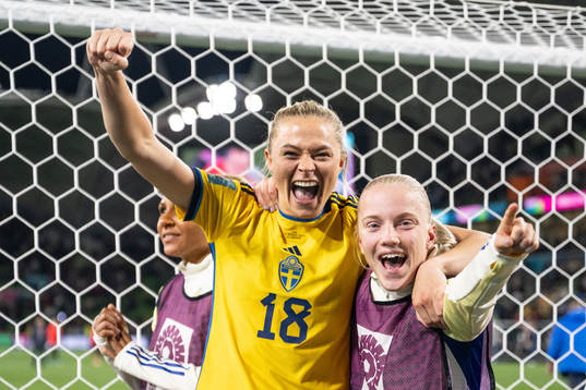 Fridolina Rolfö and Anna Sandberg of Sweden celebrate