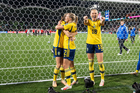 Jonna Andersson and Fridolina Rolfö of Sweden celebrate