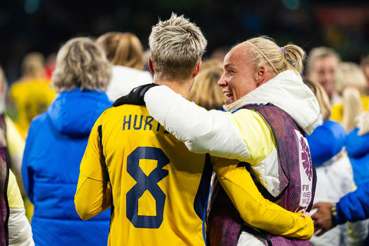 Lina Hurtig and Caroline Seger of Sweden celebrate